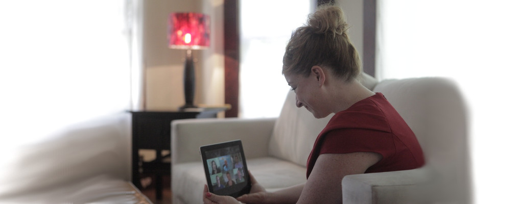 woman doing online substance abuse counseling on an iPad